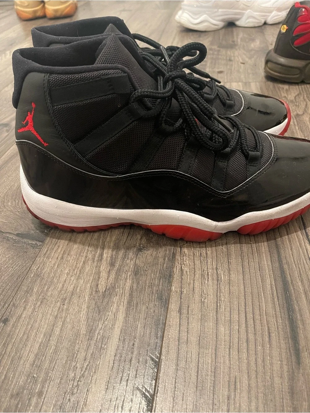 Jordan Bred 11s Retro High-Top Sneakers (Size 12)